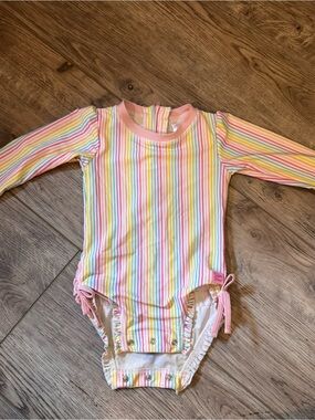 Ruffle Butts rainbow stripe one peice